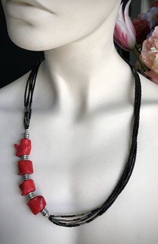 5 Strands, Black Beads W/4 Big Coral Beads